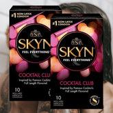 Two boxes of LifeStyles SKYN Cocktail Club Non-Latex Condoms are displayed. Each box contains 10 lubricated, flavored condoms inspired by famous cocktails. The packaging features vibrant imagery and the tagline "Feel Everything," making these scented condoms a unique addition to your intimate moments.